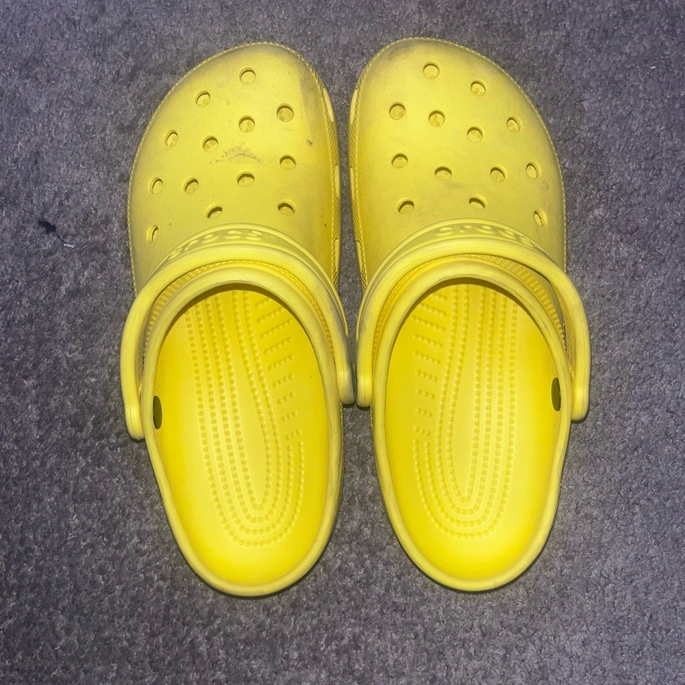 Yellow youth crocs
